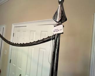 E24 - $150. Fancy - Sturdy Garment Rack. Solid metal. Does NOT come apart. You will need a truck to transport. The tallest part is 77" x 6' long.