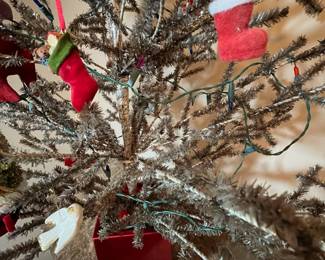 E11 - $95. Vintage Feather Tree (was stuck in the new red pot). Measures 51" tall.