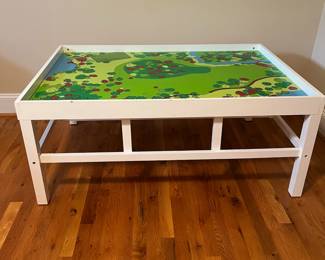 E58 - $50. Train Table. Measures 48.5" x 32.75" x 20.5" tall. It is not double sided.