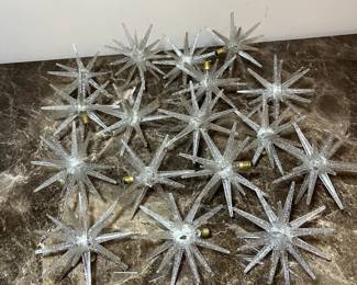 E123 - $60 for 17. 2 sets available. Vintage MCM Atomic Star Christmas Lights.