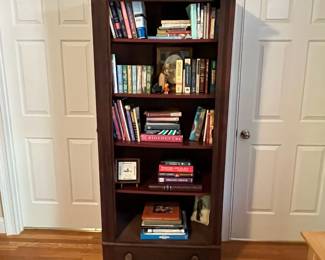E49 - $75. Antique Cabinet. Measures 31.25" x 15.75" deep x 75.25" tall. Perfectly functional as a bookcase like it is in the photograph! It used to have a door (we do not have it)