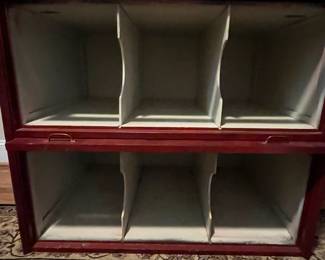 E25 - $650. Antique Cabinet. One Piece. Barrister Style Glass Doors that pull down to protect merchandise. I believe this was also from an old store. Measures 38.25" wide x 26.5" deep x 49" tall.