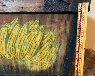 E107 - $75. Banana Crate. Measures 34.5" long x 16" wide x 13" tall.