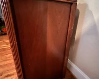 E30 - $150. Measures 43.5" wide x 20" deep x 35.5" tall. Drawers slide. There is minor veneer damage. Mirror looks original.