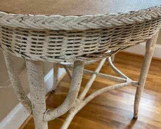 E1 - $125. Oval Wicker Wooden Top Dresser. Measures 48" x 24.5" x 30.5" tall.