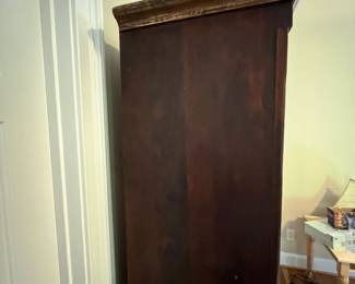 E49 - $75. Antique Cabinet. Measures 31.25" x 15.75" deep x 75.25" tall. Perfectly functional as a bookcase like it is in the photograph! It used to have a door (we do not have it)