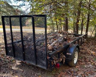 G27 - $1200. 5.5 x 10' Flat Trailer.