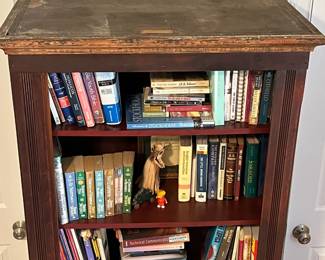 E49 - $75. Antique Cabinet. Measures 31.25" x 15.75" deep x 75.25" tall. Perfectly functional as a bookcase like it is in the photograph! It used to have a door (we do not have it)