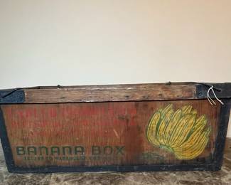 E107 - $75. Banana Crate. Measures 34.5" long x 16" wide x 13" tall.