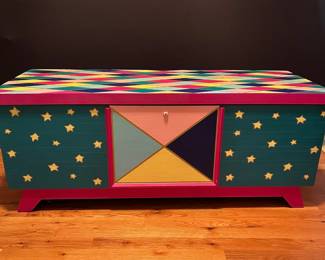 E32 - $75. Painted Lane Cedar Chest. Measures 47" wide x 17.5" deep x 19" tall.