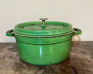 E70 - $50. Staub #26. 10 1/4" Dutch Oven. Needs cleaning.
