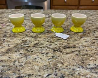 E16 - $25. Le Creuset Egg Cups. Set of 4.