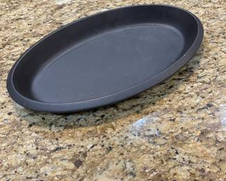 E41 - $30. Le Creuset Non Enameled Cast Iron. Measures 17" x 10".