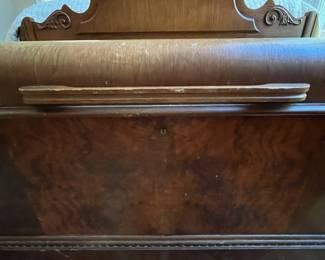 E51 - $50. Roos Cedar Chest. Measures 47" x 19" x 22.5" tall. Cedar on the inside is very nice - veneer needs some repair on the outside.