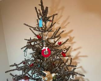 E11 - $95. Vintage Feather Tree (was stuck in the new red pot). Measures 51" tall.