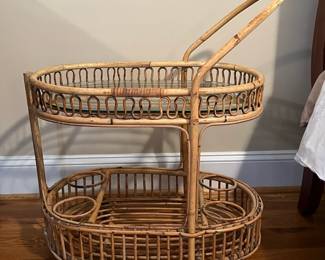 E43 - $40. Small Wicker Tea Cart. (Needs cleaned.) Measures 25" x 16.5" x 30" tall.