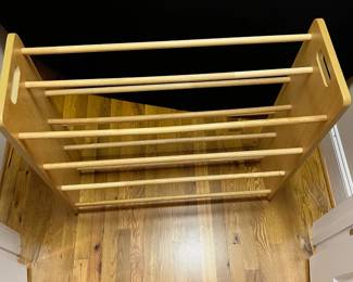E69 - $30. Toy Sorter with Plastic Baskets. Measures 33.75" x 11.5" deep x 31" tall.