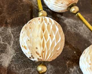 E125 - $60 EACH. 2 available. Vintage Crepe Paper Honey Comb Garland. Each is 104" long.