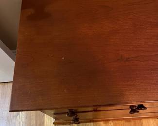 E28 - $75. Stanley Nightstand. Measures 27" wide x 16" deep x 24.25" tall.