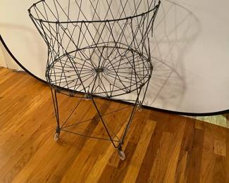 E14 - $75. Vintage Wire Laundry Basket - Black.