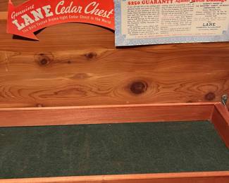 E32 - $75. Painted Lane Cedar Chest. Measures 47" wide x 17.5" deep x 19" tall.