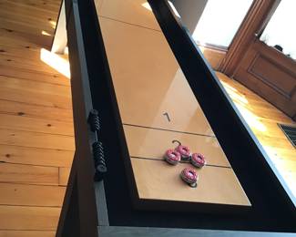 Shuffleboard table with wax