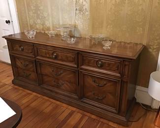 Long low triple dresser, glass
