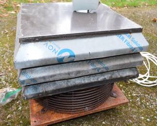 Woodstove chimney exhaust fan