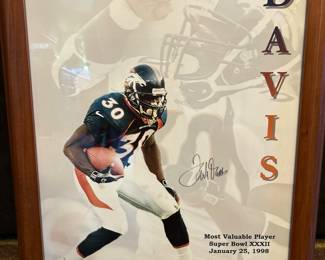 Certificate of authenticity with autographed poster.