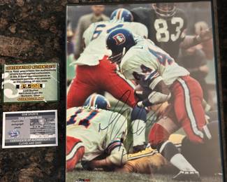 Certificate of authenticity included with signed picture.