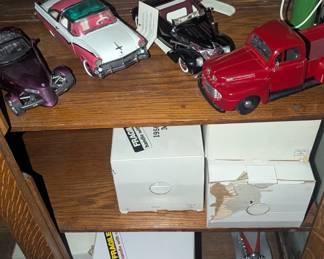 Danbury Mint cars.
Over 20 models with papers and boxes