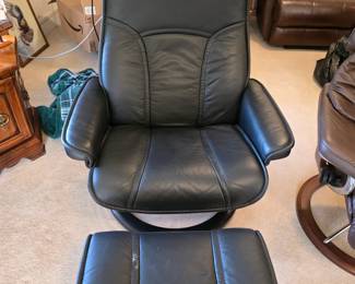 We have two chairs that are the Cadillacs of TV and gaming chairs.  With foot rests.