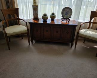 This is a beautiful Henredon cabinet with a pair of Beideiemeir chairs.