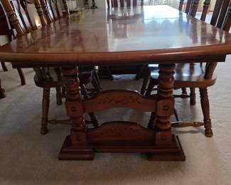 Solid maple farm house table and 6 chairs. This large table is solid, heavy and in perfect condition.