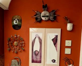 Teo lithographs by Amado Maurilio Peña, a Native American artist of Yaqui -titled "Native American Man w/Pot"
Yupik "Spirit Wheel" or "Spirit Mask" artwork— an Inupiat Eskimo Spirit
Native American Gourd Mask
Vada Ceramic Wall Planter
Danish wrought iron wall sconce with a glass cup and candle.