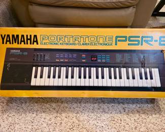 Vintage Yamaha Portatone PSR-6 electronic keyboard with Stand