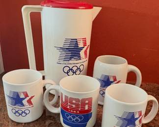 Vintage coffee mugs and Pitcher commemorating the 1984 Summer Olympics in Los Angeles