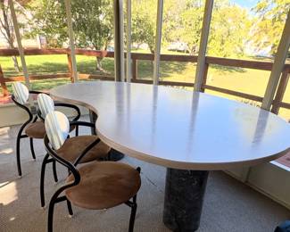 Custom made Granite Dinning Table designed to seat 10 that can see each other.