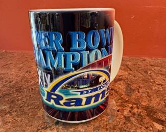 St. Louis Rams Super Bowl XXXIV Champions ceramic mug.