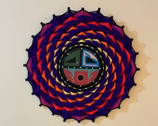 Navajo Yei mandala, Native American wall art. The mandala features a central hand-painted Yei, or Holy People, figure.