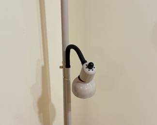 vintage floor lamp with a torchiere top and an adjustable gooseneck reading light.