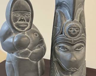 Inuit soapstone carvings—
Haida argillite totem pole carving