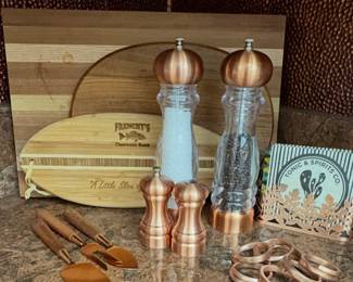 Chef Specialties 29185 Professional Series Vanguard Pepper Mill in a rose gold finish-and Williams Sonoma Olde Thompson 7" Del Norte Copper Pepper Mill and Salt Shaker Set and Copper Napkin rings and holder -cutting boards