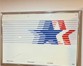 Signed poster for the 1984
Los Angeles Summer Olympics, featuring the official "Stars in Motion" logo.
• The logo was designed by graphic designer Robert Miles Runyan.