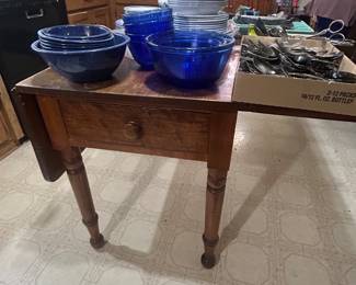 Antique drop leaf table with drawer