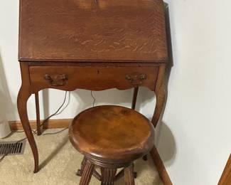 Drop down secretary desk. Claw foot stool