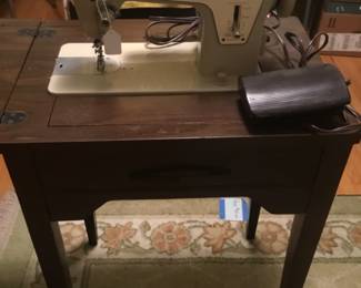 Singer sewing machine with table
