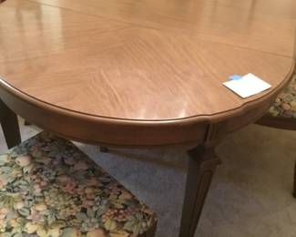 63 1/2”L x 39 1/2”W including two 12” leafs. 4 chairs