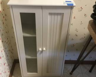 3 shelf storage cabinet. 19”W x 9 1/2”D x 35 1/2”H