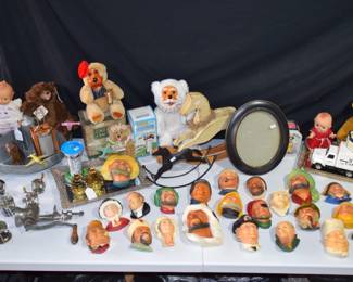 Vintage chalk heads, vintage toys and fishing reels etc.